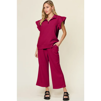 Double Take Texture Ruffle Short Sleeve Top and Drawstring Wide Leg Pants Set.
