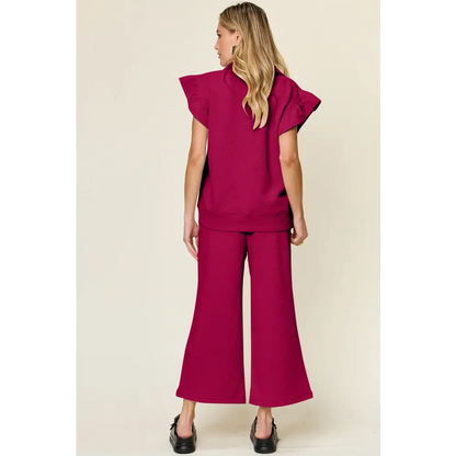 Double Take Texture Ruffle Short Sleeve Top and Drawstring Wide Leg Pants Set.