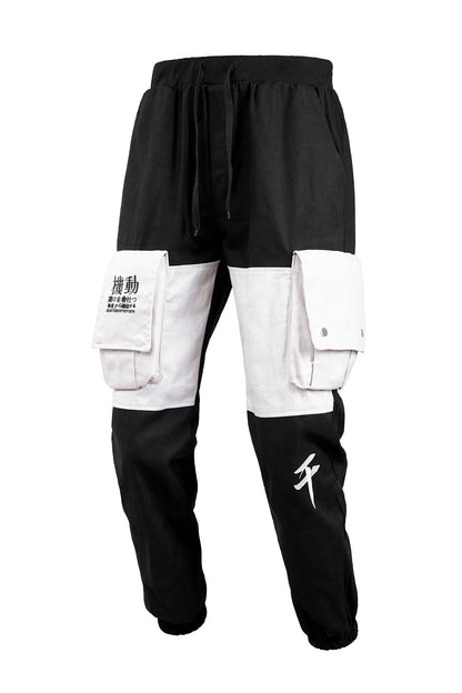 Black and white cargo pants with visible branding on a white background