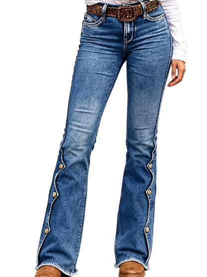 Medium wash blue flare jeans with decorative silver-tone buttons running down the outer sides, styled with a brown belt and white top.