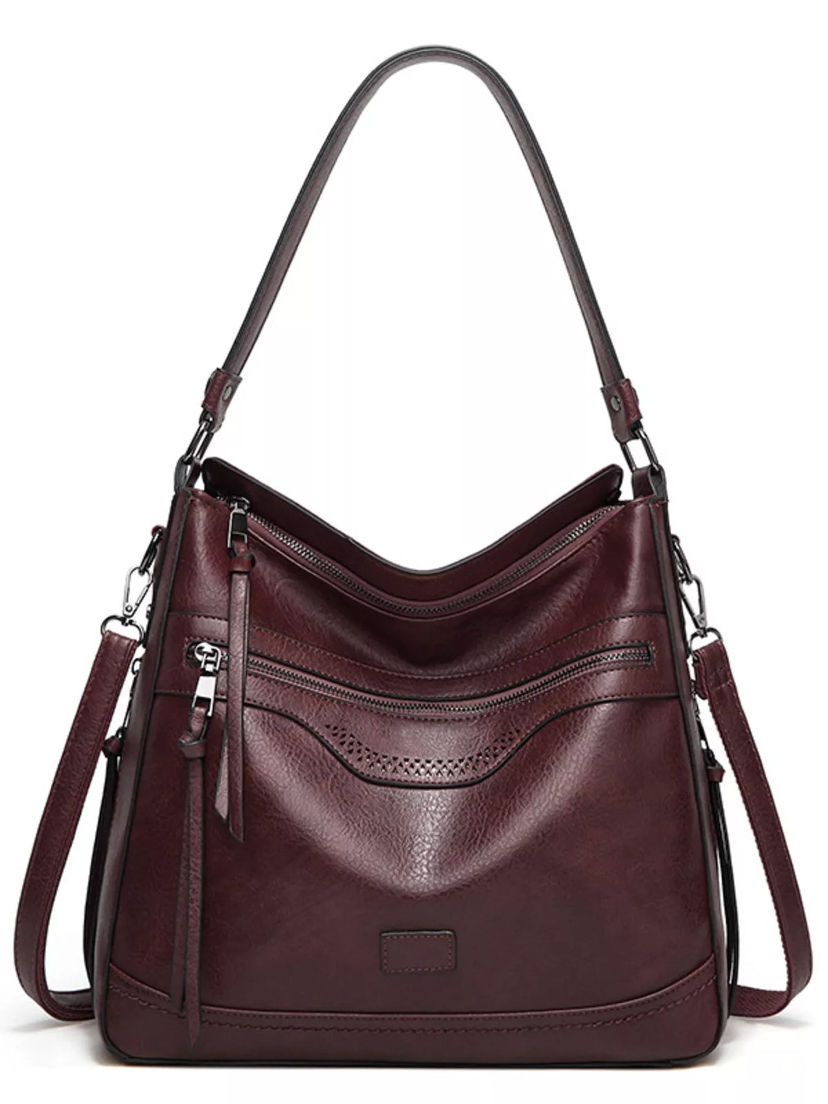A dark burgundy leather hobo shoulder bag with multiple zippered pockets, a front pebbled panel, and a long shoulder strap, shown on a plain white background.