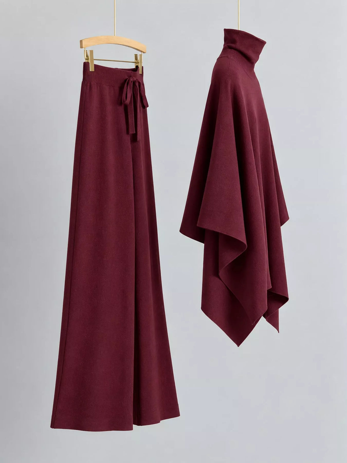 Turtleneck poncho sweater and matching wide-leg knit pants set