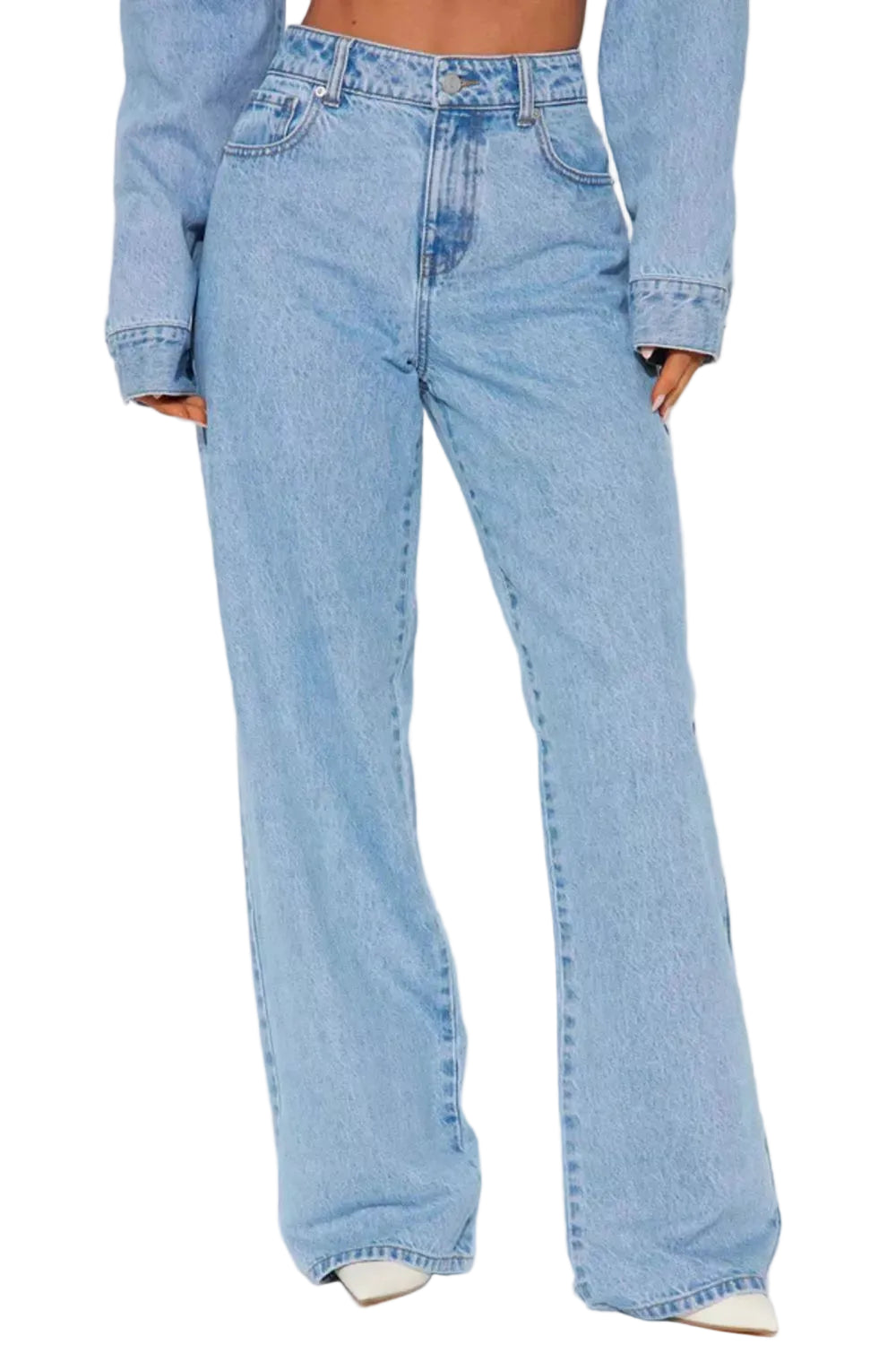 Light wash blue wide-leg denim jeans shown on a model from the waist down, paired with a matching cropped long-sleeve denim top and white pointed shoes against a plain white studio background.