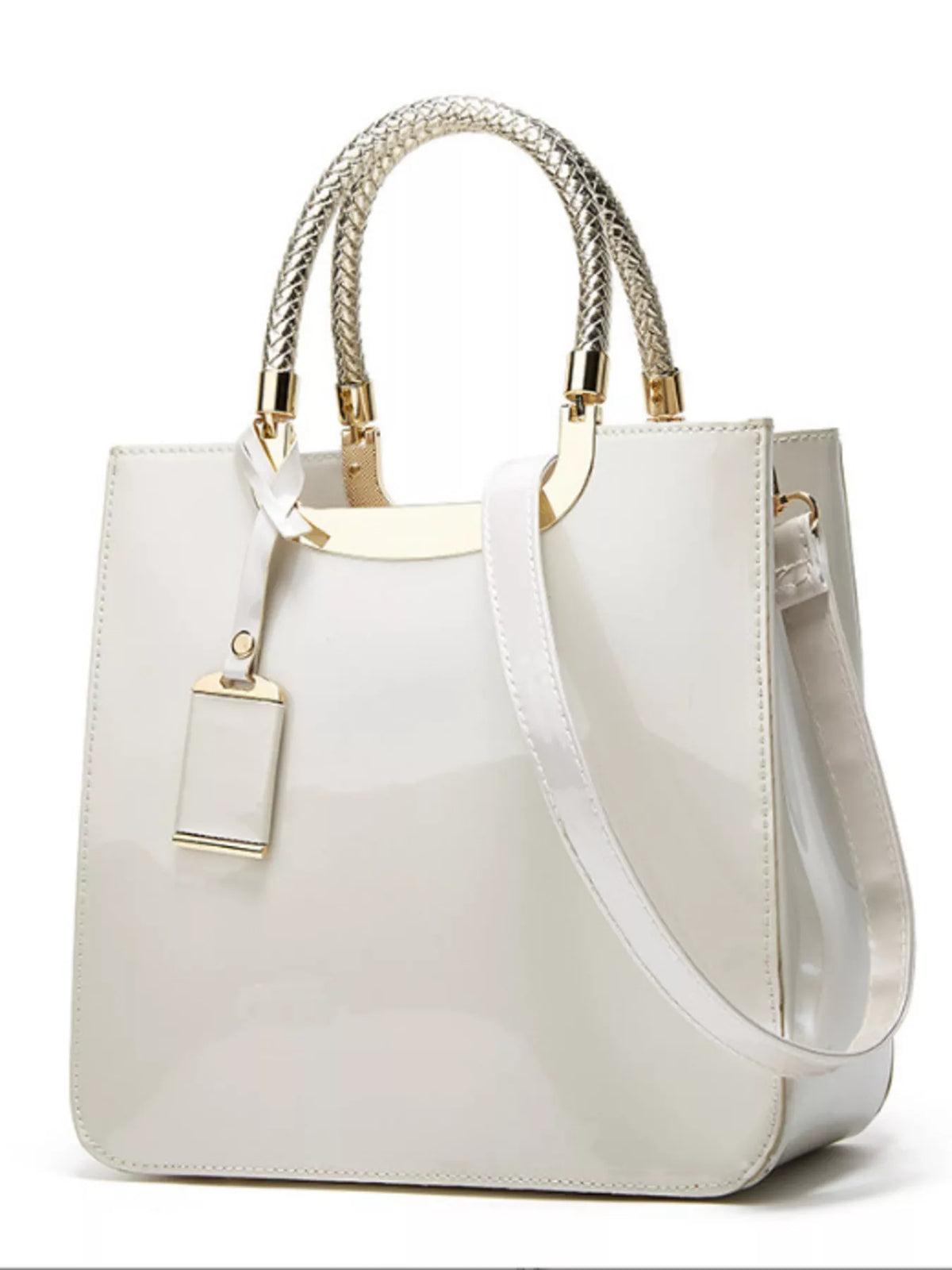 A glossy white patent leather tote bag with braided top handles, gold-tone hardware, and a matching white shoulder strap, shown on a plain white background.