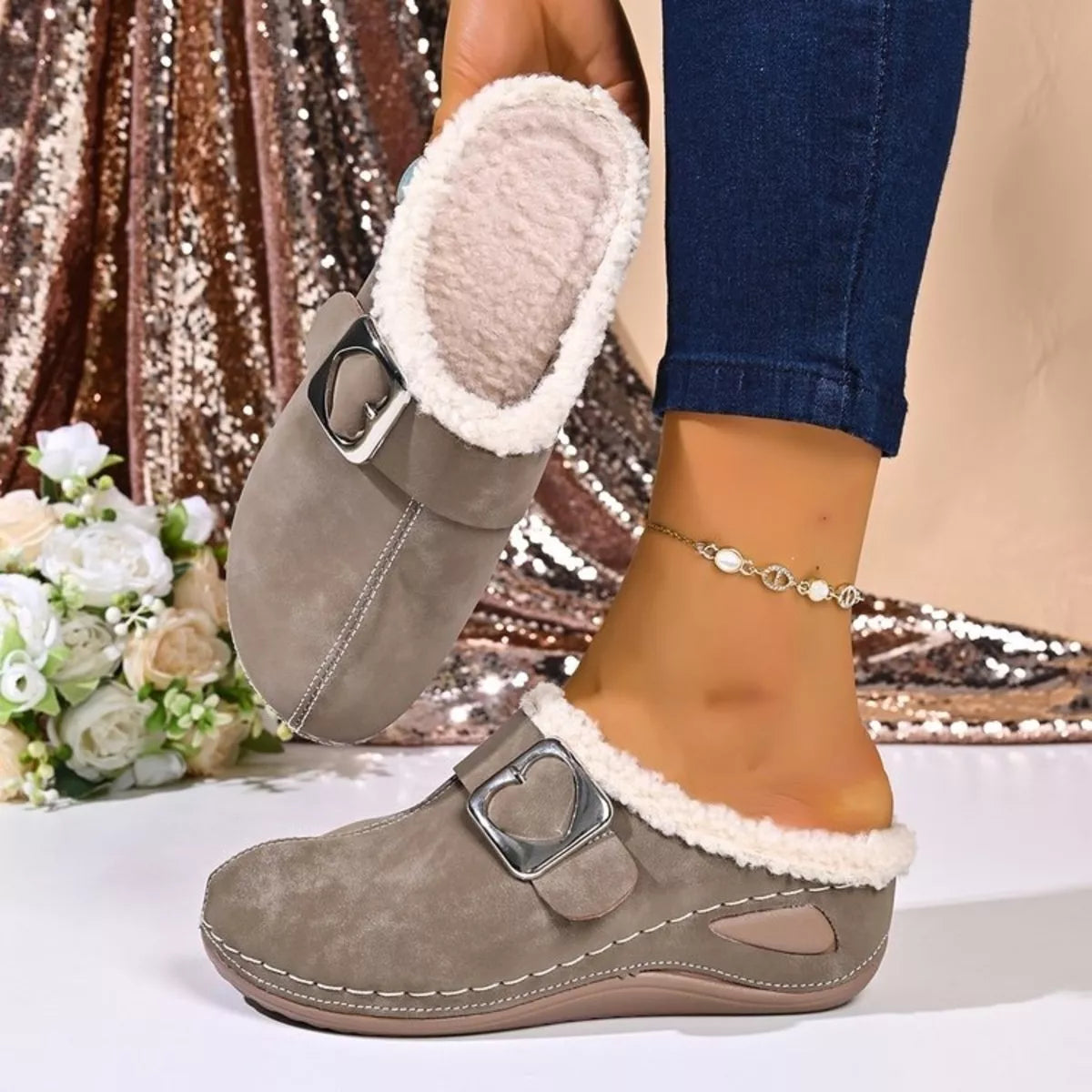 Faux fur-lined slip-on shoes with heart buckle
