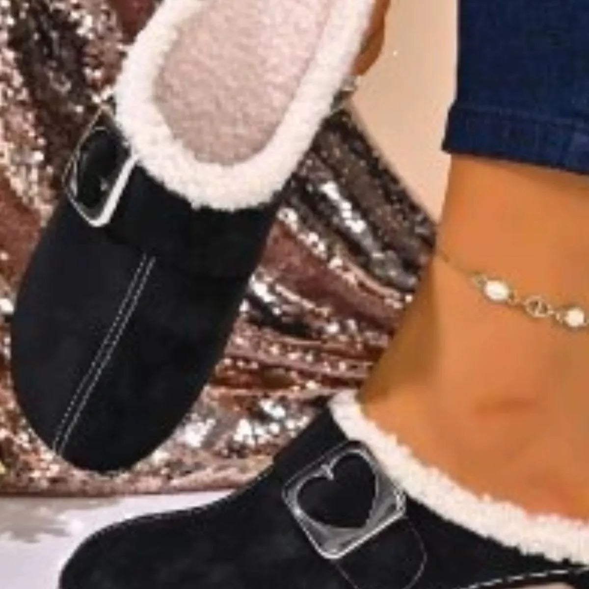 Faux fur-lined slip-on shoes with heart buckle