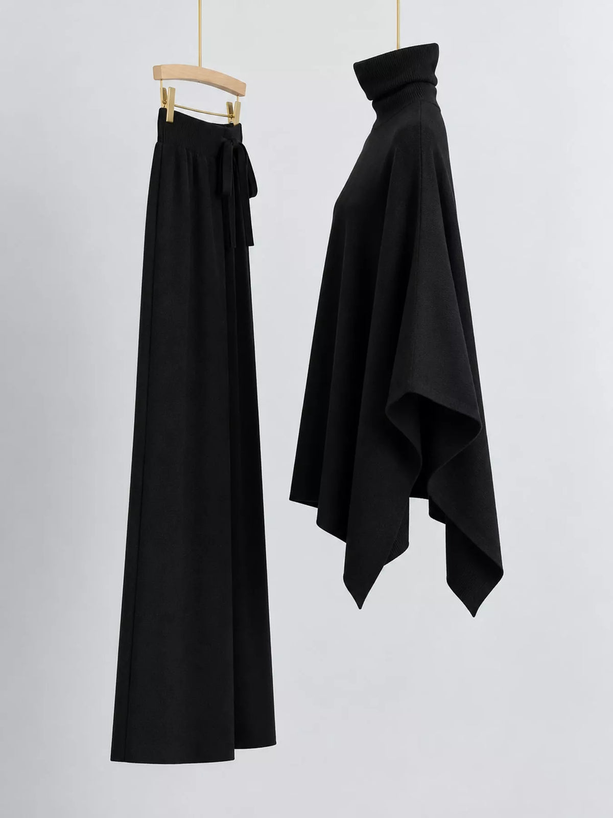 Turtleneck poncho sweater and matching wide-leg knit pants set