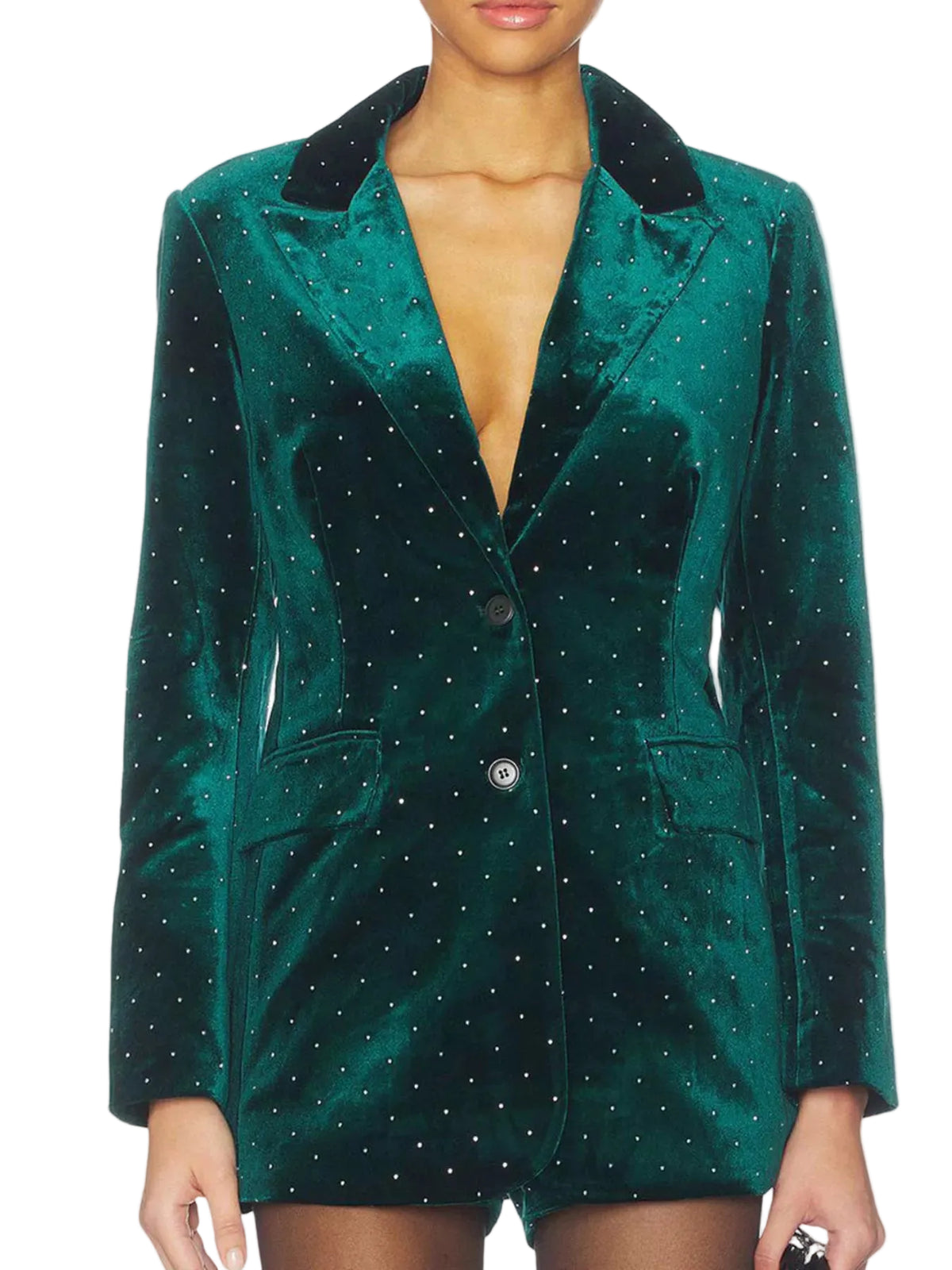 A woman wearing a dark green velvet blazer with small silver rhinestone dots and a contrasting black velvet collar, shown against a plain white background.