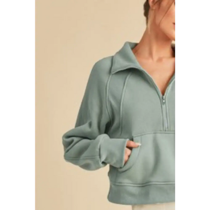 Half Zip Raglan Sleeve Hoodie with Kangaroo Pocket.