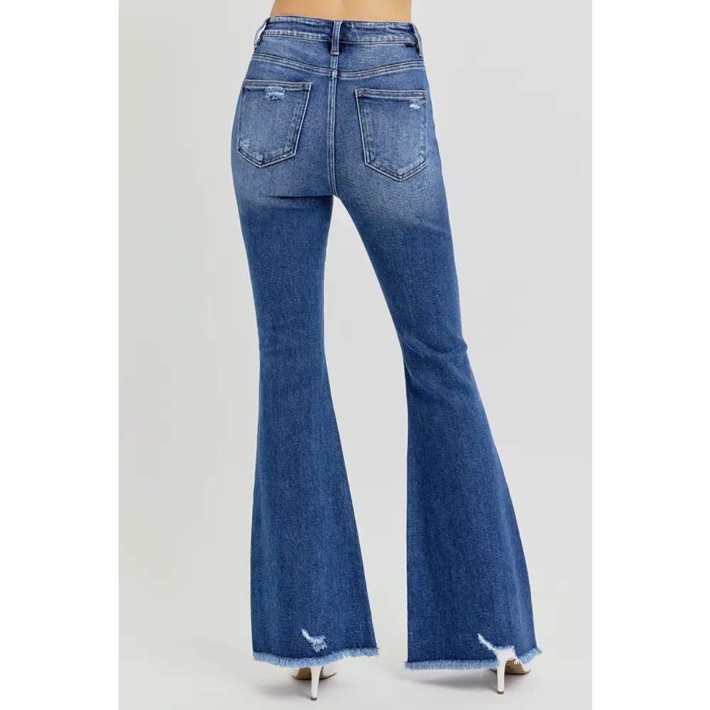 High Rise Distressed Raw Hem Flare Jeans.
