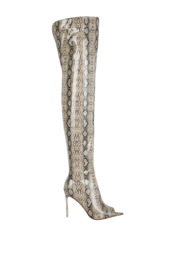 Snake print over-the-knee high heel boot on a white background