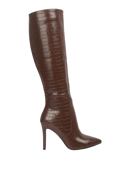 Brown knee-high boot with high heel on a light gray background