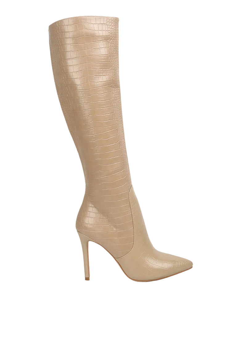 Beige knee-high boots with high heels on a white background