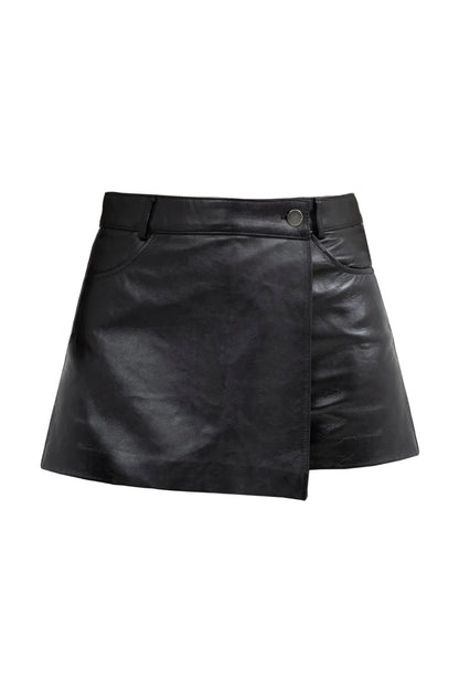 Black leather skirt on a light gray background
