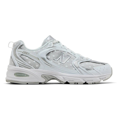New Balance 530 sneakers in White Silver Metallic with polka dots