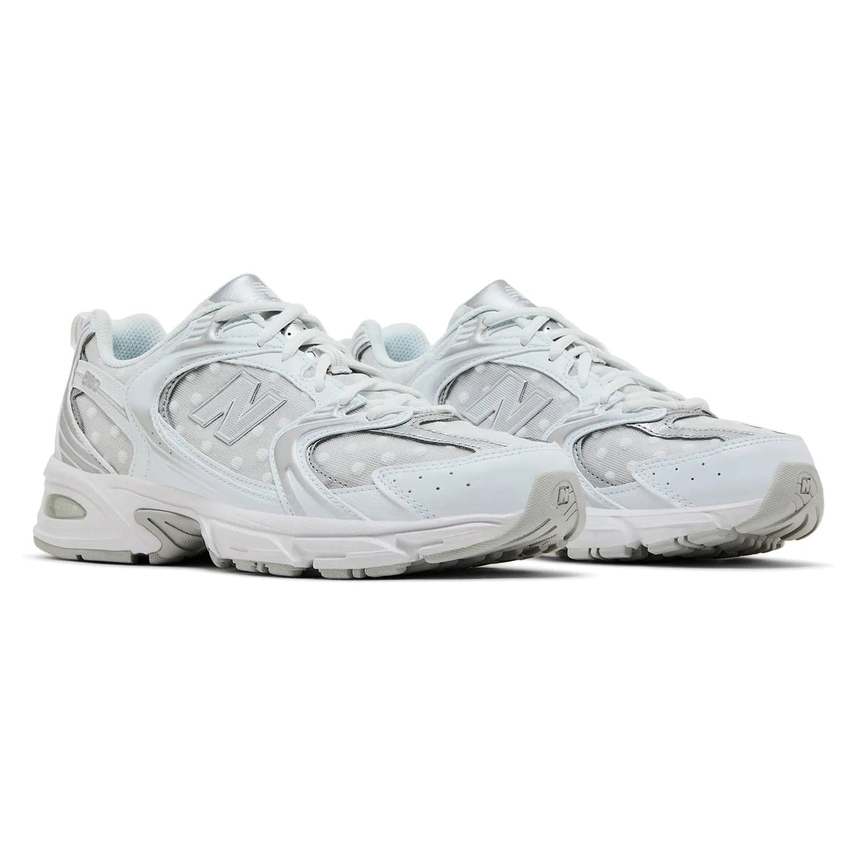 New Balance 530 sneakers in White Silver Metallic with polka dots