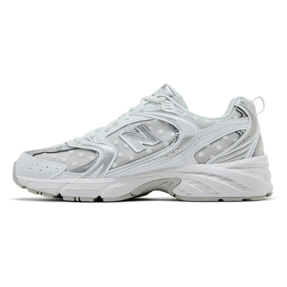 New Balance 530 sneakers in White Silver Metallic with polka dots