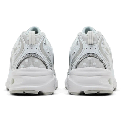 New Balance 530 sneakers in White Silver Metallic with polka dots