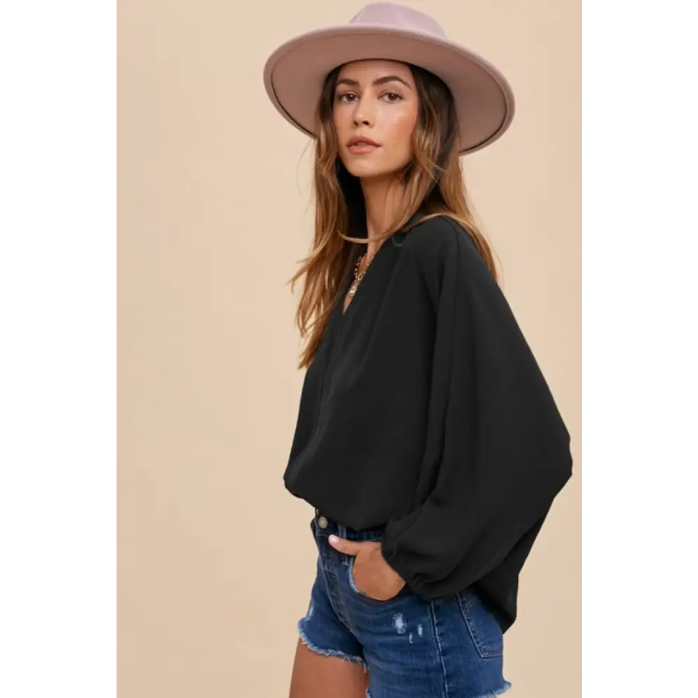 Notched Batwing Sleeve Blouse.
