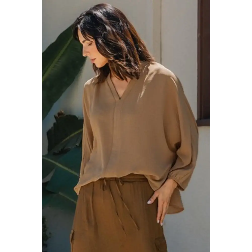 Notched Batwing Sleeve Blouse.