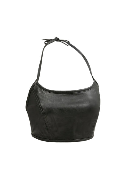 A black faux-leather halter crop top bag with a curved, slouchy silhouette and a thin adjustable tie strap, shown against a light gray background.
