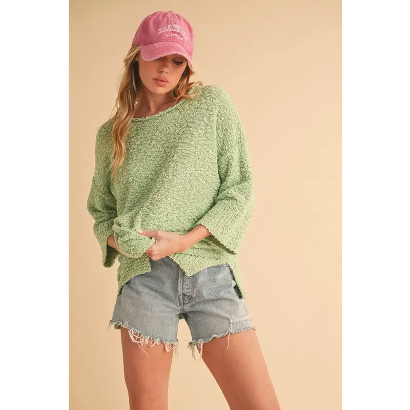 Side Slit Ribbed Hem Round Neck Sweater.