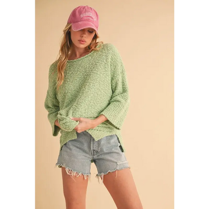 Side Slit Ribbed Hem Round Neck Sweater.
