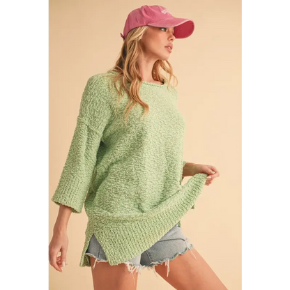 Side Slit Ribbed Hem Round Neck Sweater.