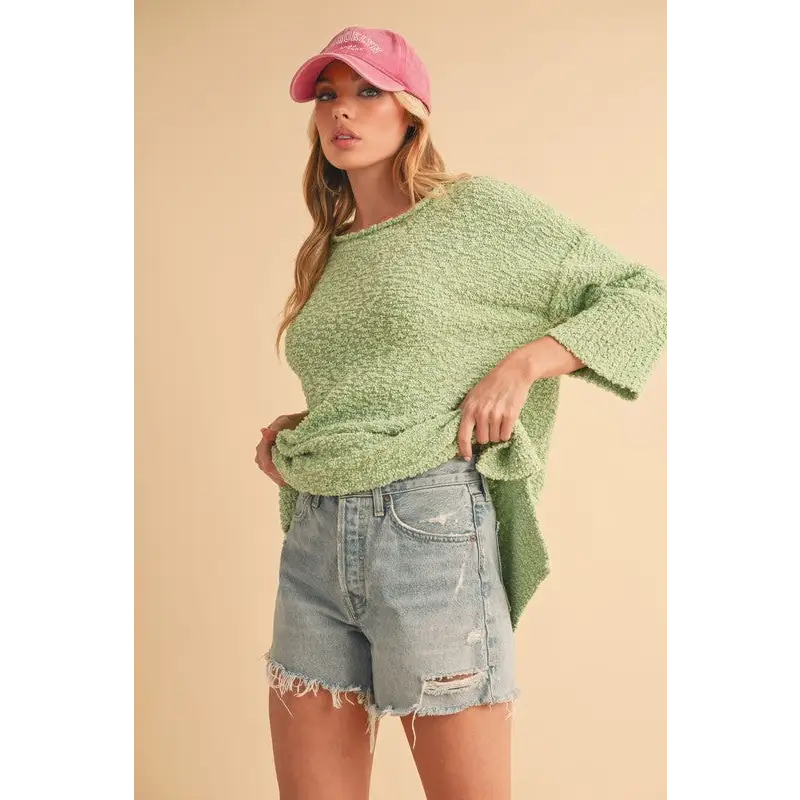Side Slit Ribbed Hem Round Neck Sweater.
