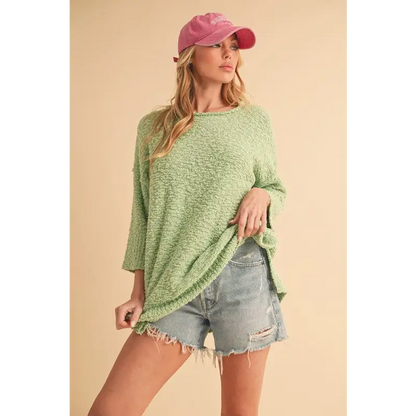 Side Slit Ribbed Hem Round Neck Sweater.