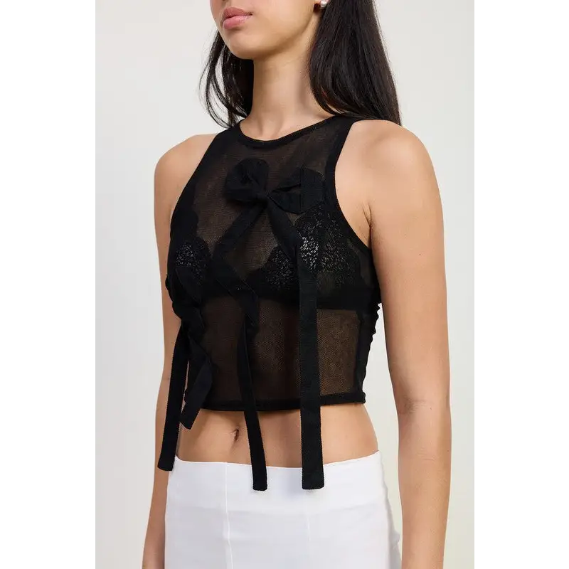 Sleeveless Sheer Bow Top.