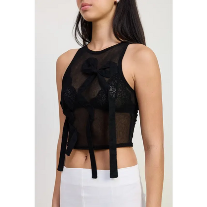 Sleeveless Sheer Bow Top.