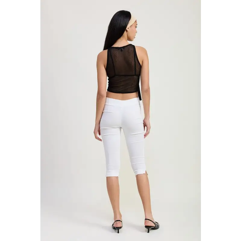 Sleeveless Sheer Bow Top.
