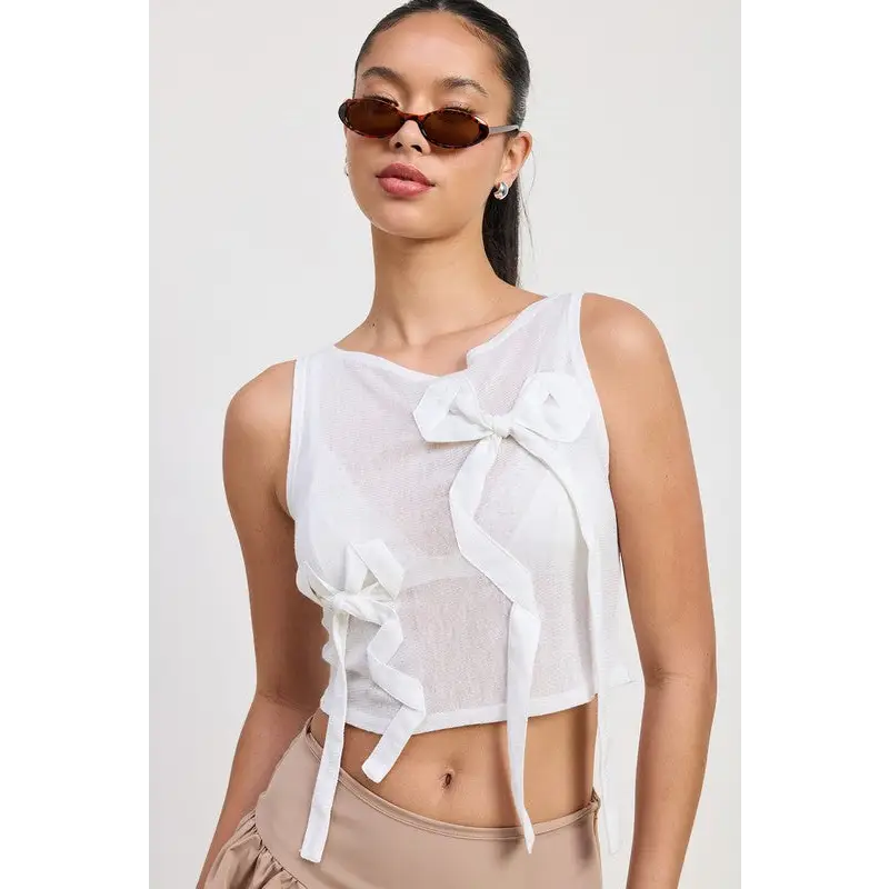 Sleeveless Sheer Bow Top.