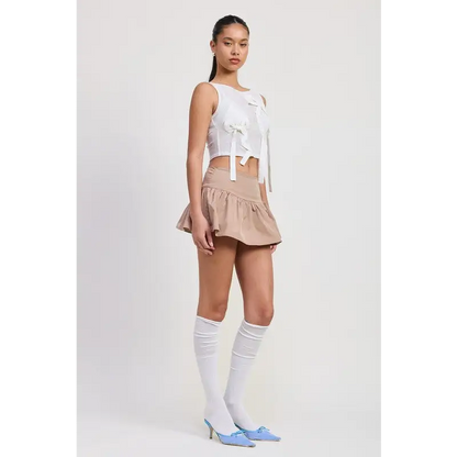 Sleeveless Sheer Bow Top.
