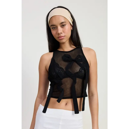 Sleeveless Sheer Bow Top.