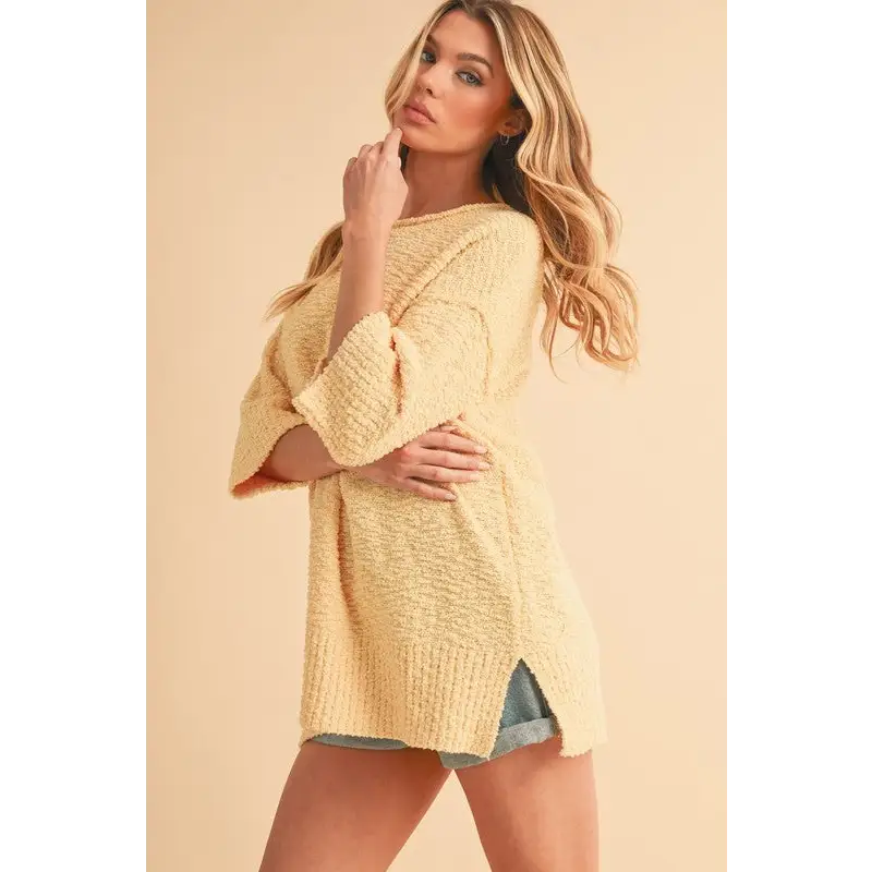 Slit Ribbed Hem Round Neck Sweater.