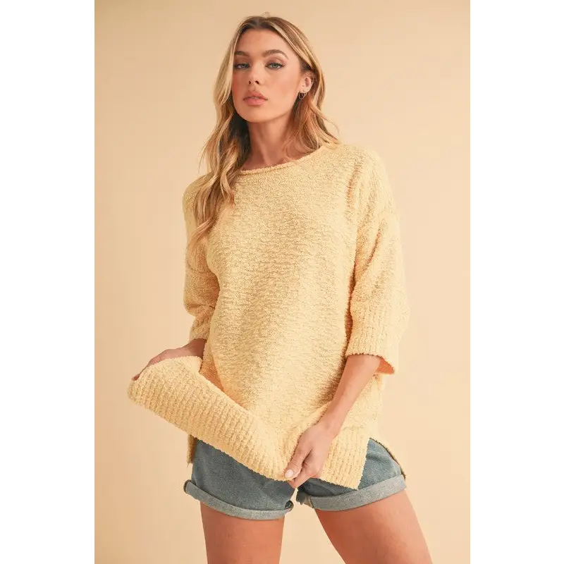Slit Ribbed Hem Round Neck Sweater.