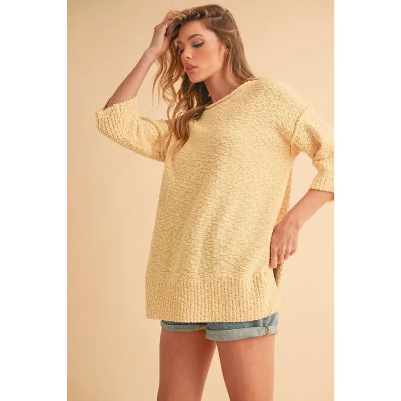 Slit Ribbed Hem Round Neck Sweater.