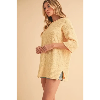 Slit Ribbed Hem Round Neck Sweater.