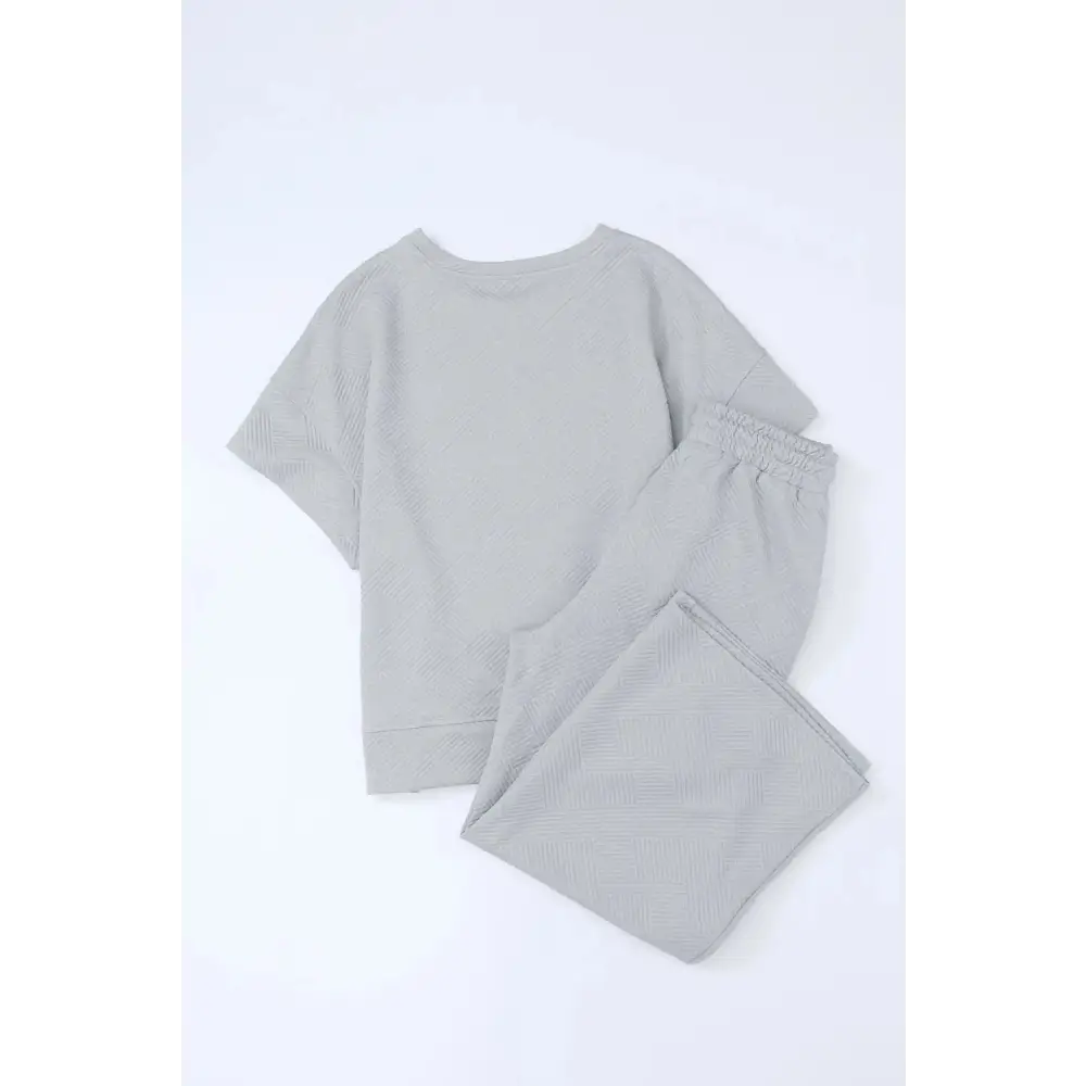 Textured Loose Fit T Shirt & Drawstring Pants Set.